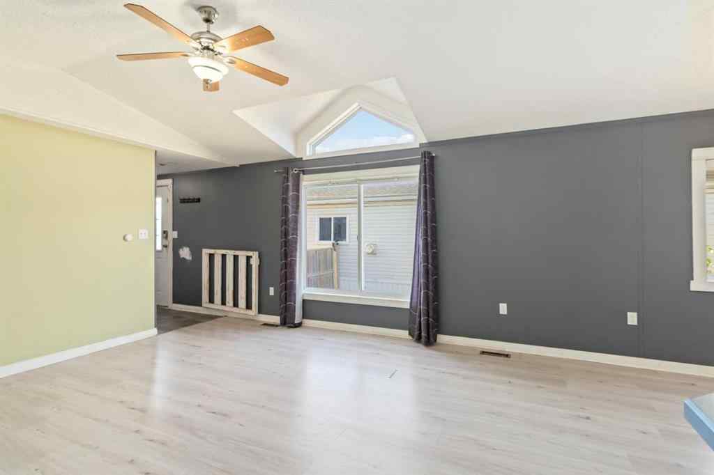 MLS® A2252399 - 215 Grant Way  in Gregoire Park Fort McMurray, Residential