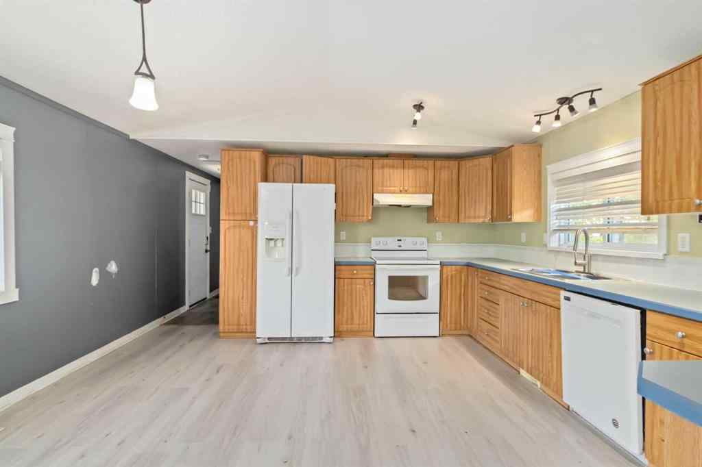 MLS® A2252399 - 215 Grant Way  in Gregoire Park Fort McMurray, Residential