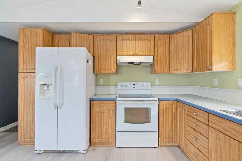 MLS® A2252399 - 215 Grant Way  in Gregoire Park Fort McMurray, Residential