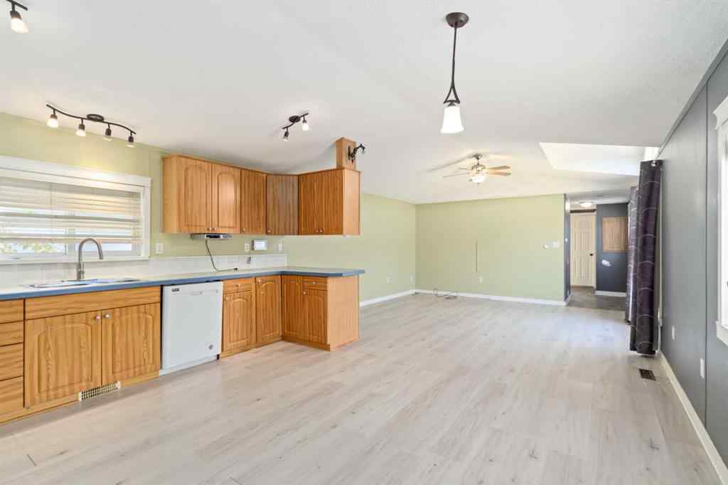 MLS® A2252399 - 215 Grant Way  in Gregoire Park Fort McMurray, Residential