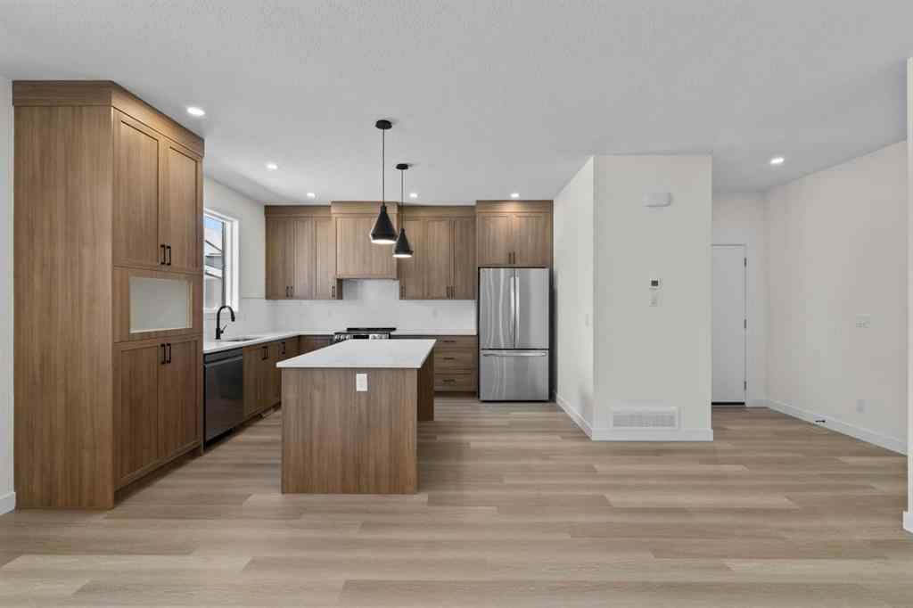 MLS® A2252415 - Unit #1004 201 Cooperswood Green SW in Coopers Crossing Airdrie, Residential