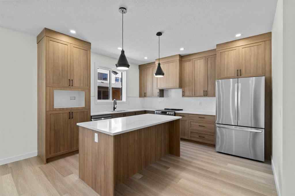 MLS® A2252415 - Unit #1004 201 Cooperswood Green SW in Coopers Crossing Airdrie, Residential