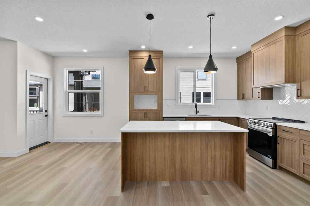 MLS® A2252415 - Unit #1004 201 Cooperswood Green SW in Coopers Crossing Airdrie, Residential