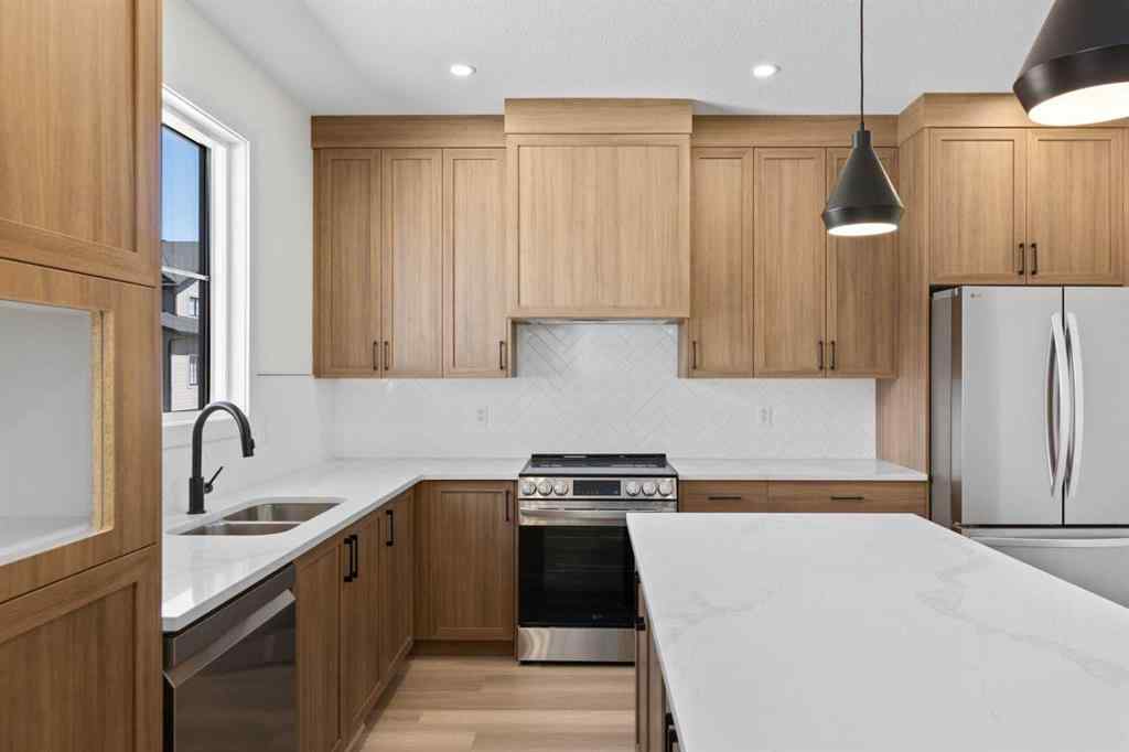 MLS® A2252415 - Unit #1004 201 Cooperswood Green SW in Coopers Crossing Airdrie, Residential