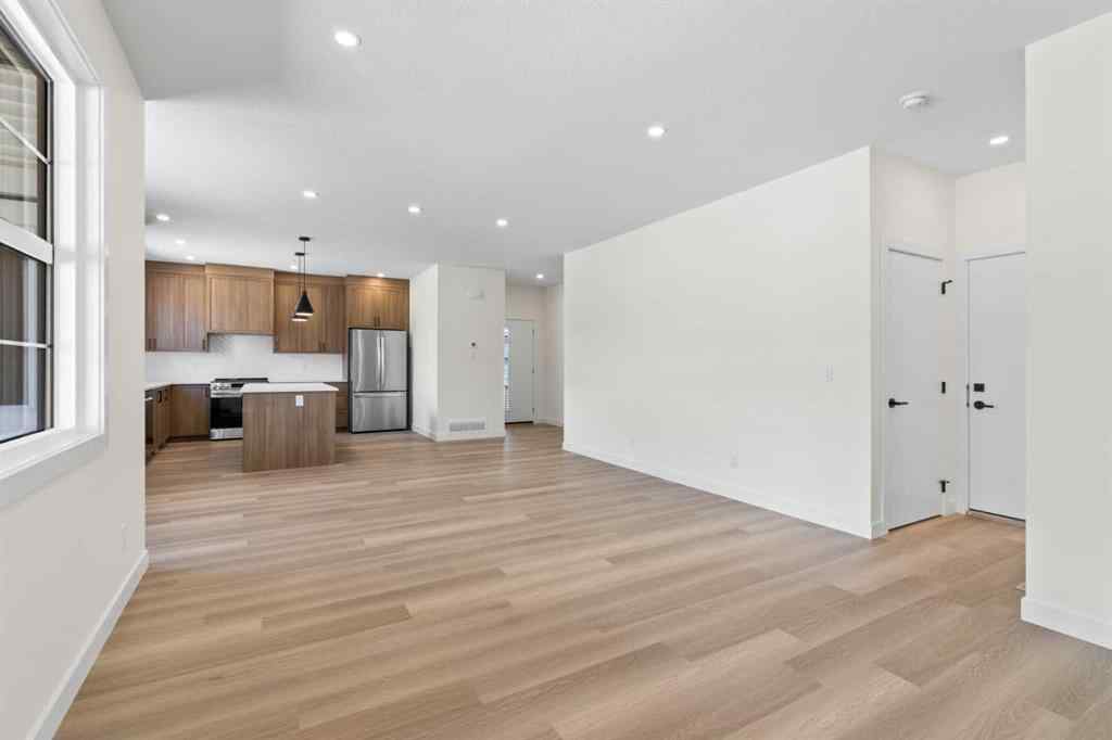 MLS® A2252415 - Unit #1004 201 Cooperswood Green SW in Coopers Crossing Airdrie, Residential