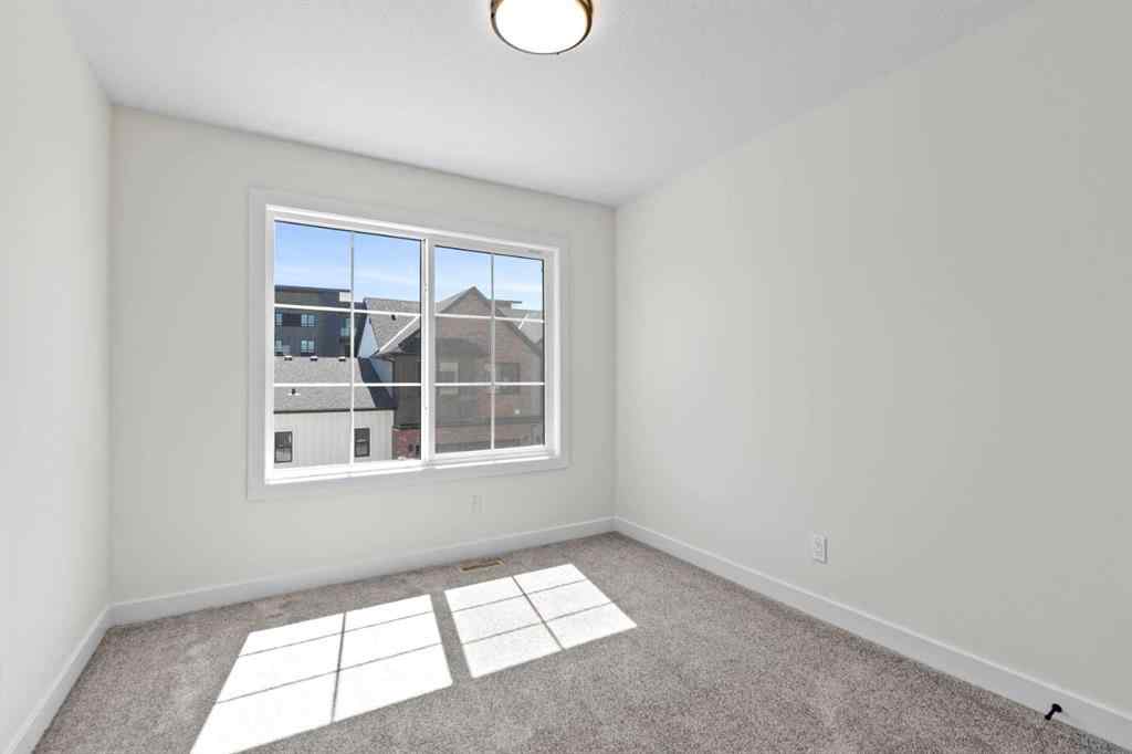 MLS® A2252415 - Unit #1004 201 Cooperswood Green SW in Coopers Crossing Airdrie, Residential