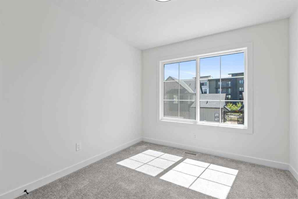 MLS® A2252415 - Unit #1004 201 Cooperswood Green SW in Coopers Crossing Airdrie, Residential