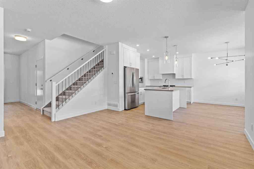 MLS® A2252417 - Unit #1003 201 Cooperswood Green SW in Coopers Crossing Airdrie, Residential