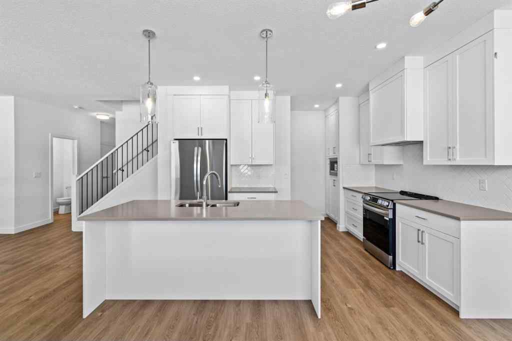 MLS® A2252417 - Unit #1003 201 Cooperswood Green SW in Coopers Crossing Airdrie, Residential