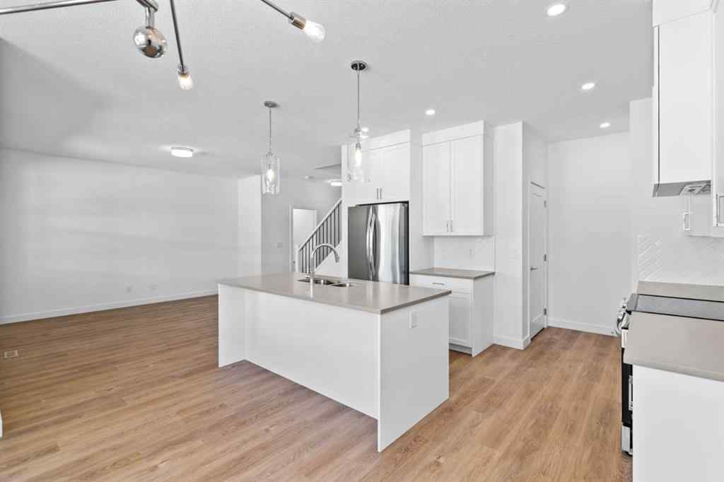 MLS® A2252417 - Unit #1003 201 Cooperswood Green SW in Coopers Crossing Airdrie, Residential