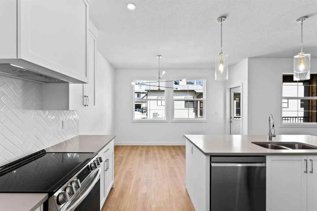 MLS® A2252417 - Unit #1003 201 Cooperswood Green SW in Coopers Crossing Airdrie, Residential