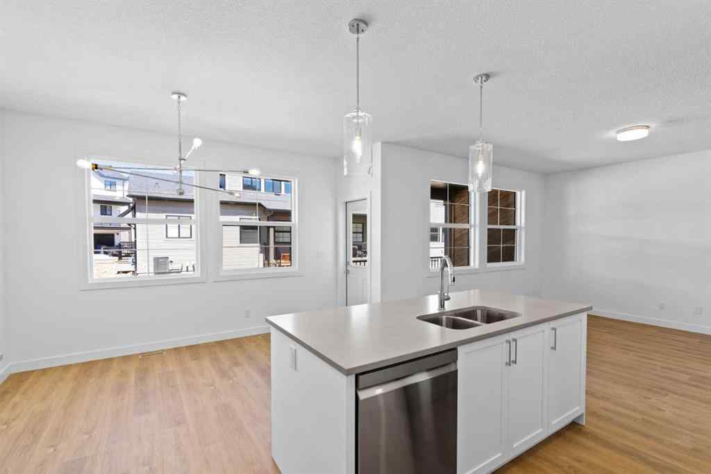 MLS® A2252417 - Unit #1003 201 Cooperswood Green SW in Coopers Crossing Airdrie, Residential