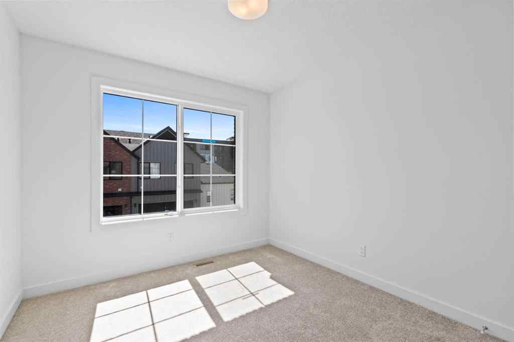 MLS® A2252417 - Unit #1003 201 Cooperswood Green SW in Coopers Crossing Airdrie, Residential