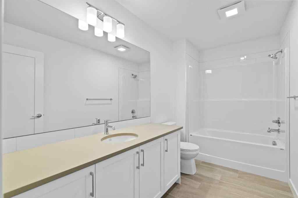 MLS® A2252417 - Unit #1003 201 Cooperswood Green SW in Coopers Crossing Airdrie, Residential