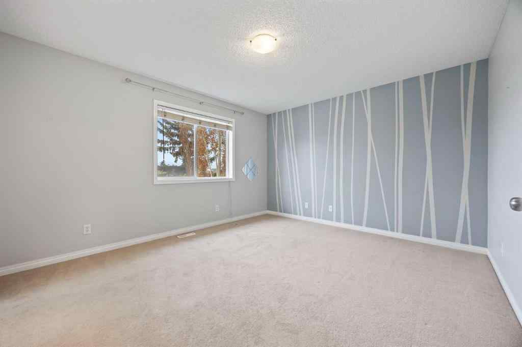 MLS® A2252424 - 230 Cougarstone Circle SW in Cougar Ridge Calgary, Residential