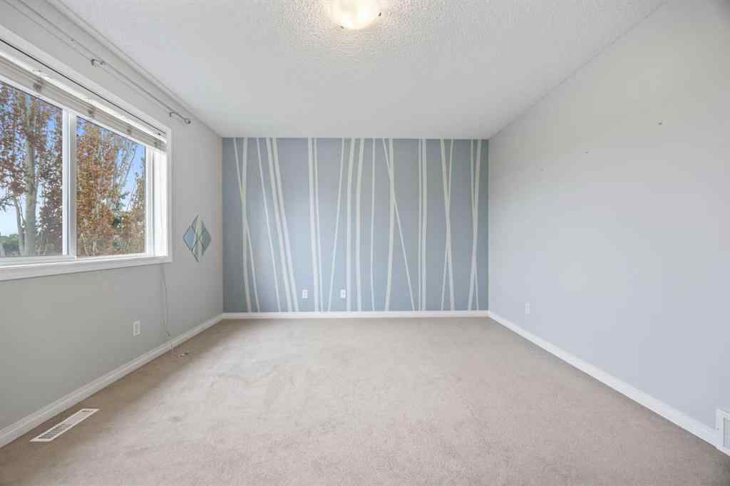 MLS® A2252424 - 230 Cougarstone Circle SW in Cougar Ridge Calgary, Residential