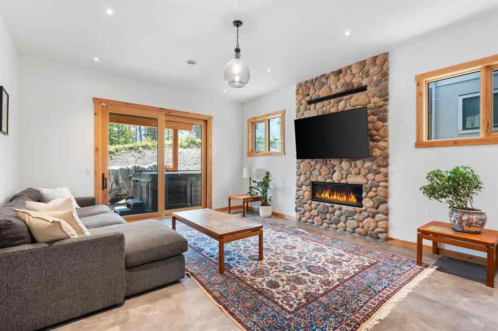 MLS® A2252436 - 232 Stewart Creek Rise  in Three Sisters Canmore, Residential
