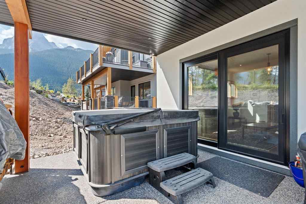 MLS® A2252436 - 232 Stewart Creek Rise  in Three Sisters Canmore, Residential