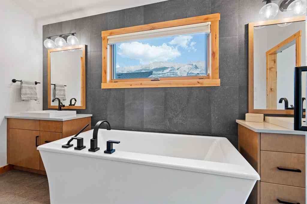 MLS® A2252436 - 232 Stewart Creek Rise  in Three Sisters Canmore, Residential