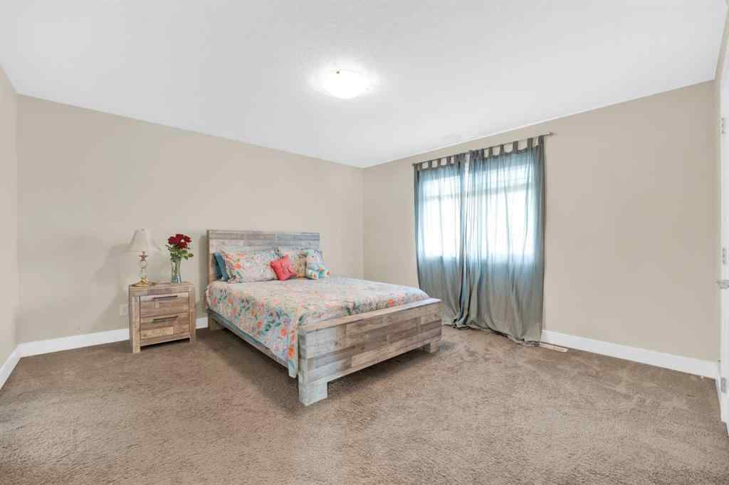 MLS® A2252453 - 164 Rainbow Falls Heath  in Rainbow Falls Chestermere, Residential
