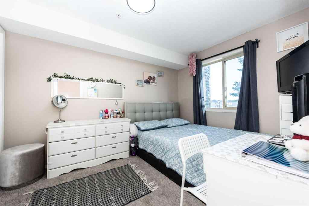 MLS® A2252497 - Unit #215 7210 80 Avenue NE in Saddle Ridge Calgary, Residential