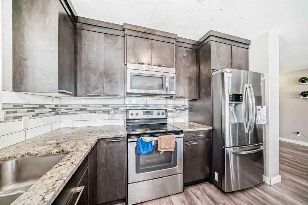 MLS® A2252511 - 702 Evanston Manor NW in Evanston Calgary, Residential