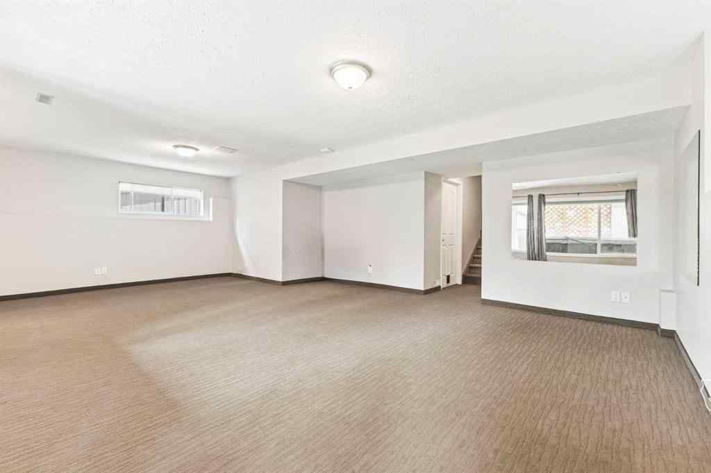 MLS® A2252529 - 30 Spring Mews SW in Springbank Hill Calgary, Residential