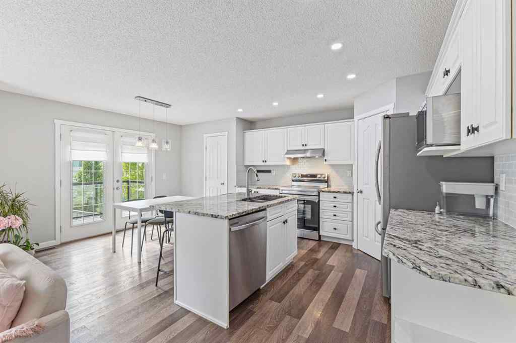 MLS® A2252529 - 30 Spring Mews SW in Springbank Hill Calgary, Residential