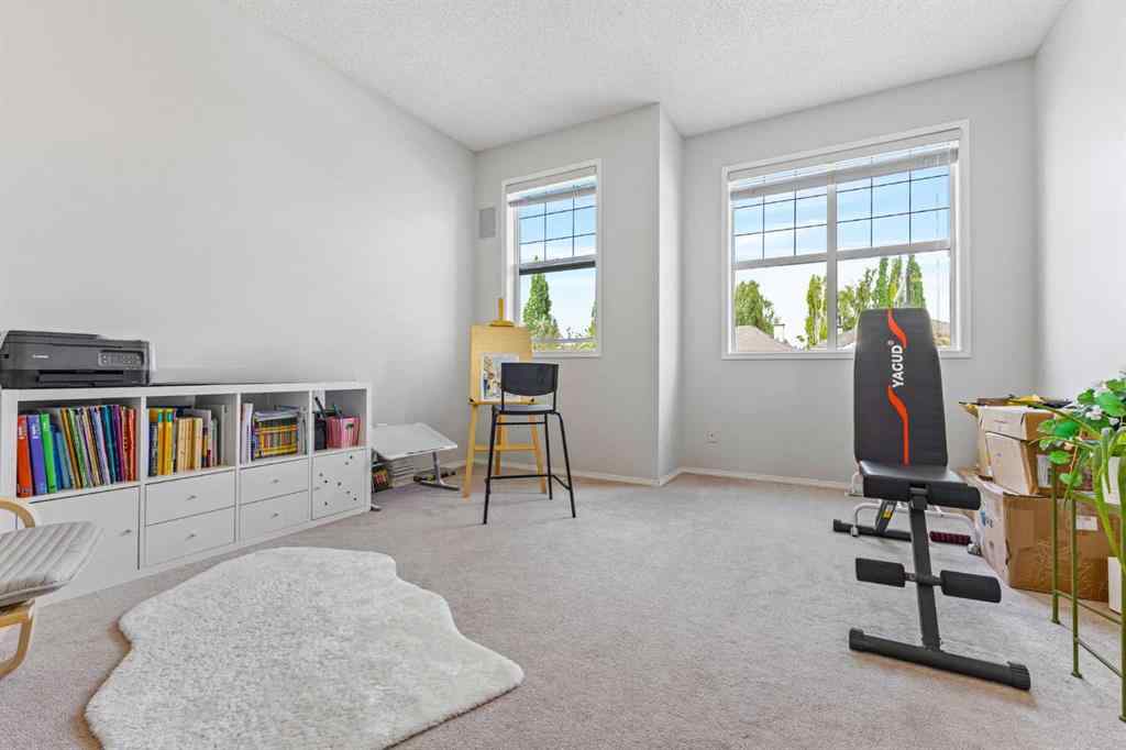 MLS® A2252529 - 30 Spring Mews SW in Springbank Hill Calgary, Residential