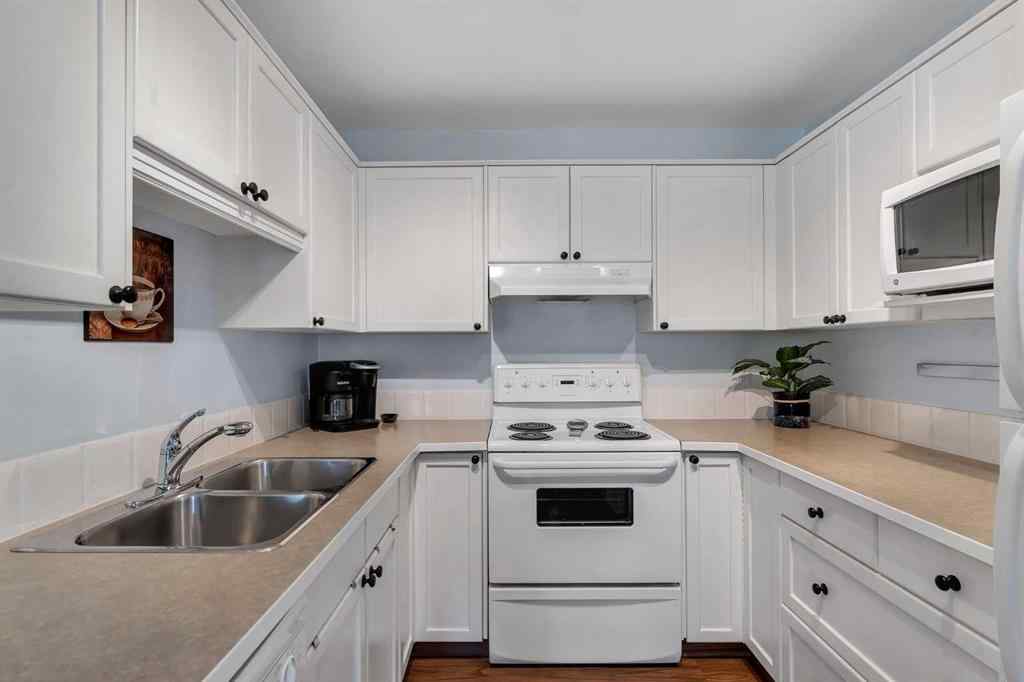 MLS® A2252548 - Unit #6 156 Canoe Drive SW in Canals Airdrie, Residential