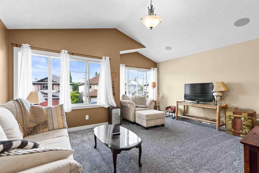 MLS® A2252549 - 212 Crystal Green Place  in Crystal Green Okotoks, Residential