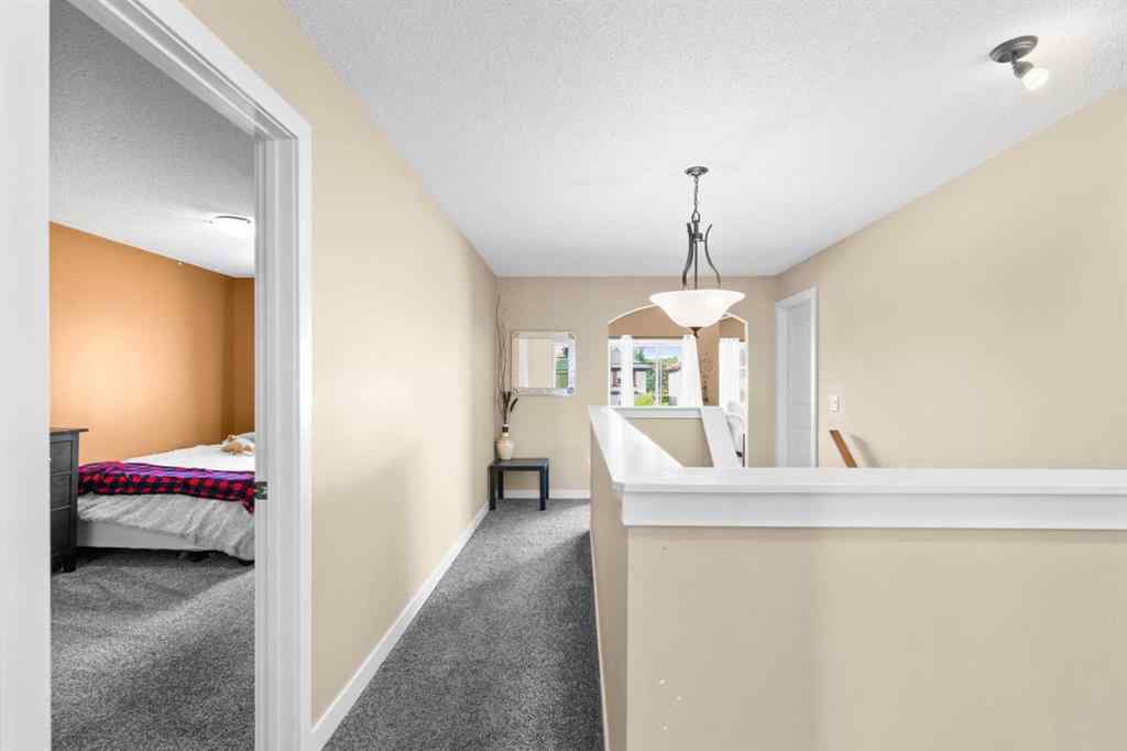 MLS® A2252549 - 212 Crystal Green Place  in Crystal Green Okotoks, Residential