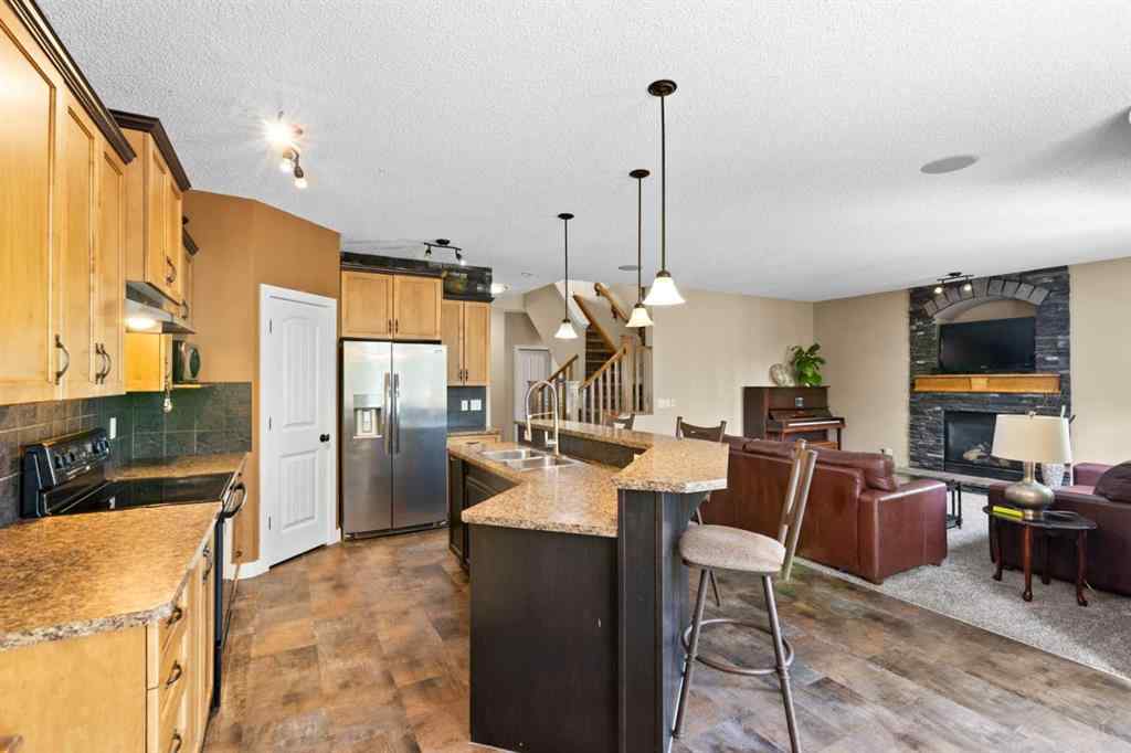 MLS® A2252549 - 212 Crystal Green Place  in Crystal Green Okotoks, Residential