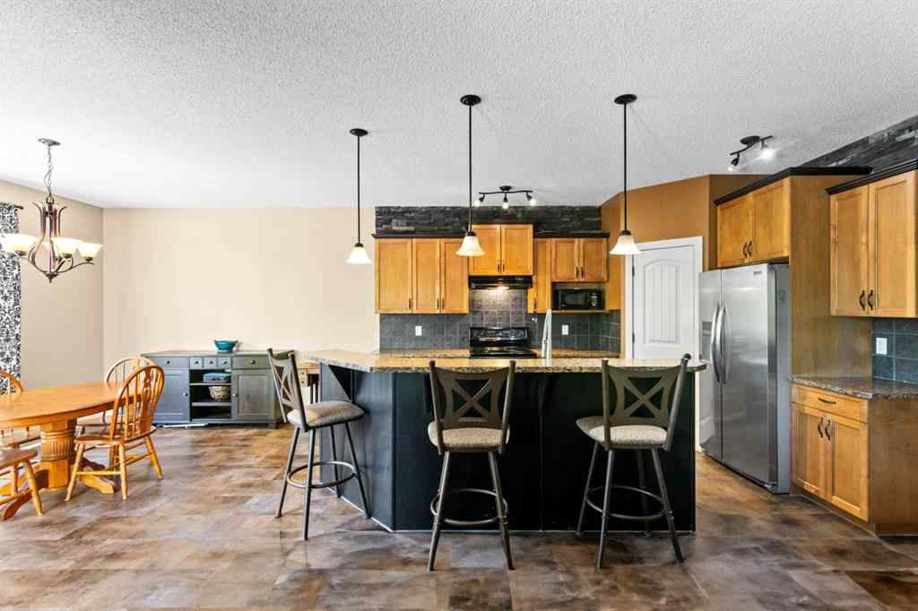 MLS® A2252549 - 212 Crystal Green Place  in Crystal Green Okotoks, Residential