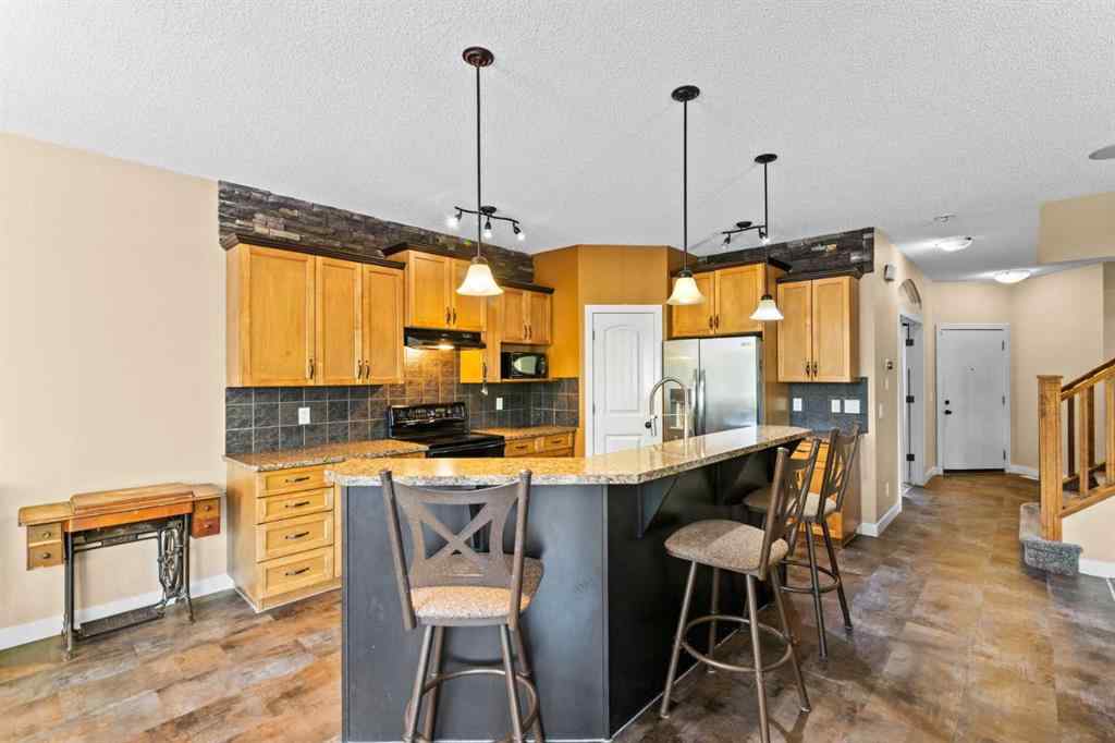 MLS® A2252549 - 212 Crystal Green Place  in Crystal Green Okotoks, Residential