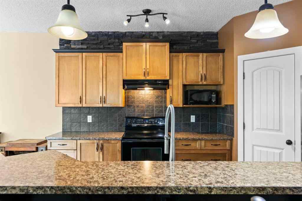 MLS® A2252549 - 212 Crystal Green Place  in Crystal Green Okotoks, Residential