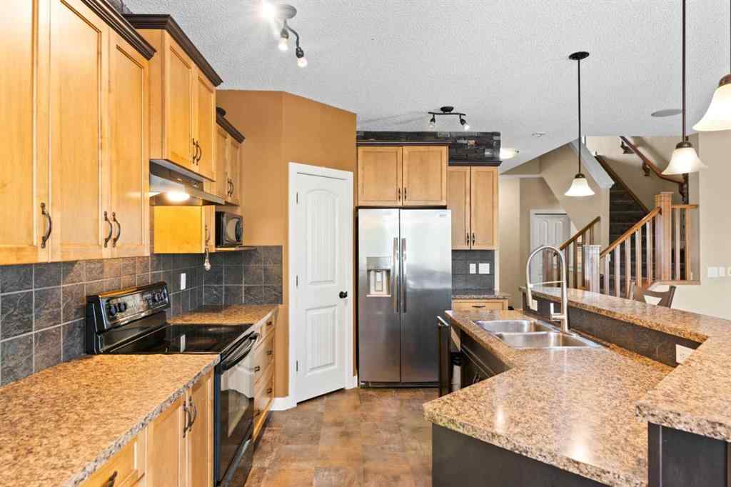 MLS® A2252549 - 212 Crystal Green Place  in Crystal Green Okotoks, Residential
