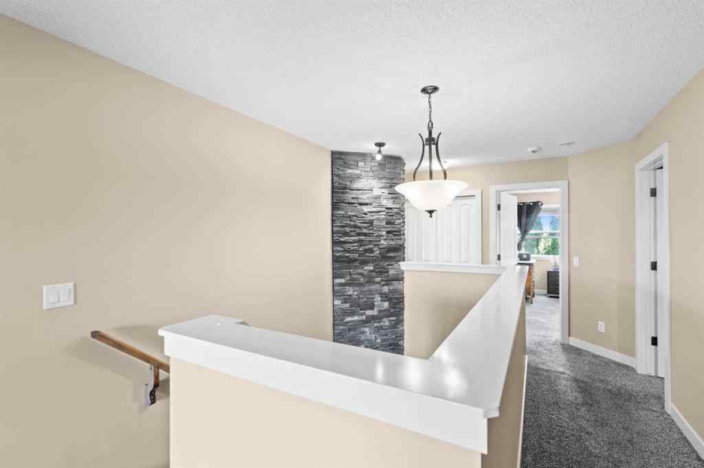 MLS® A2252549 - 212 Crystal Green Place  in Crystal Green Okotoks, Residential