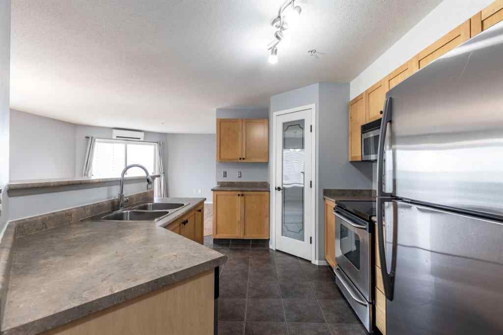 MLS® A2252604 - Unit #220 1648 Saamis Drive NW in Northwest Crescent Heights Medicine Hat, Residential