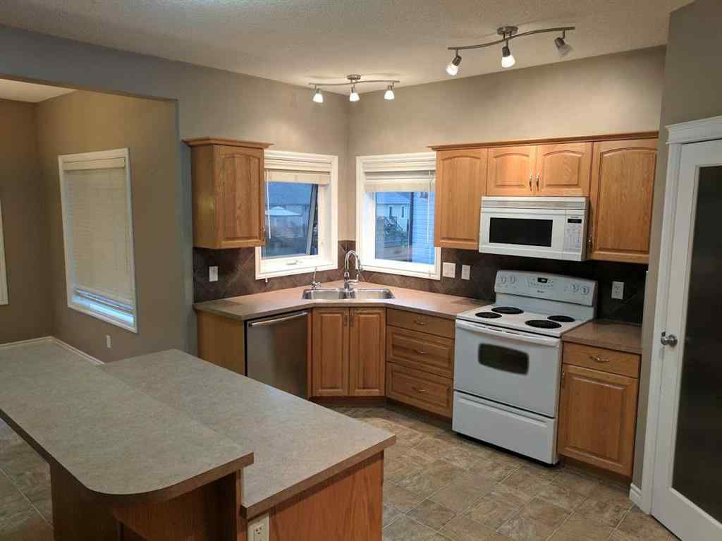 MLS® A2252616 - 8729 63 Avenue  in Summerside Grande Prairie, Residential