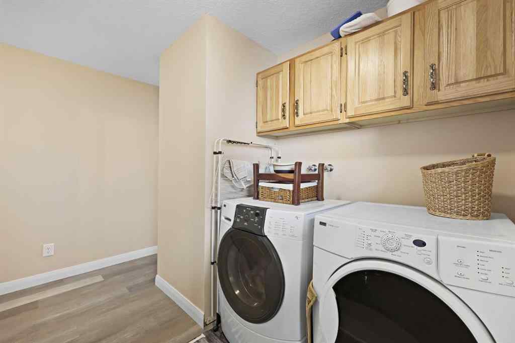 MLS® A2252634 - 100 Hawkfield Crescent NW in Hawkwood Calgary, Residential