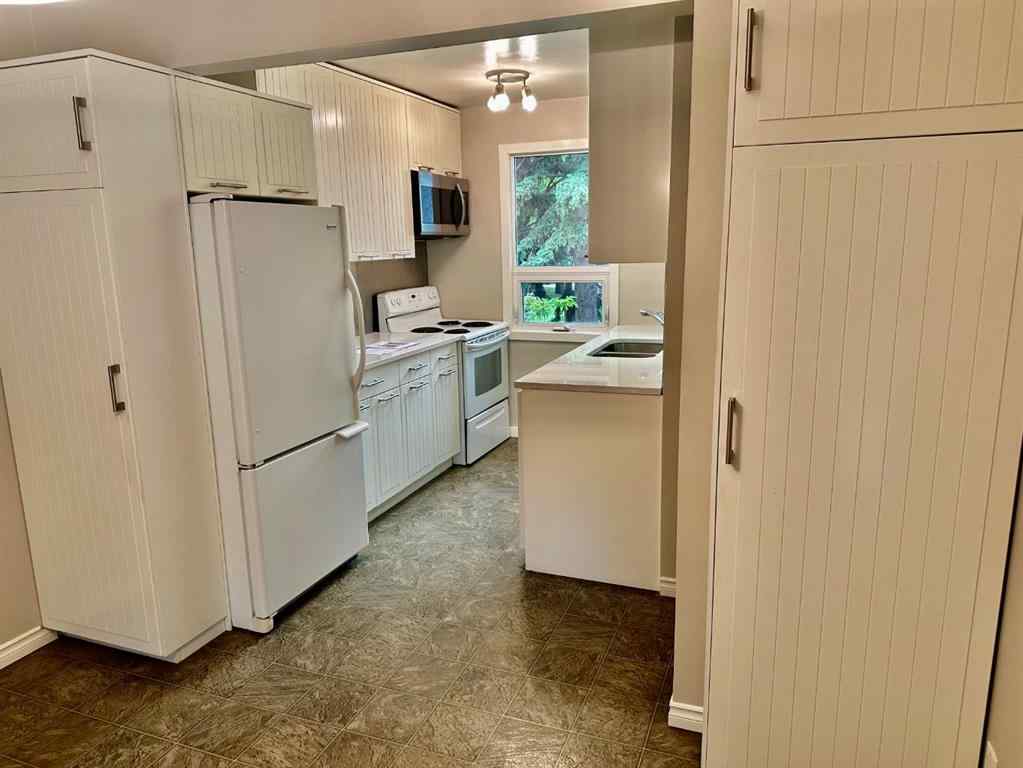 MLS® A2252659 - Unit #8 11407 Braniff Road SW in Braeside Calgary, Residential