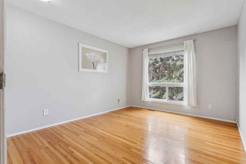 MLS® A2252659 - Unit #8 11407 Braniff Road SW in Braeside Calgary, Residential