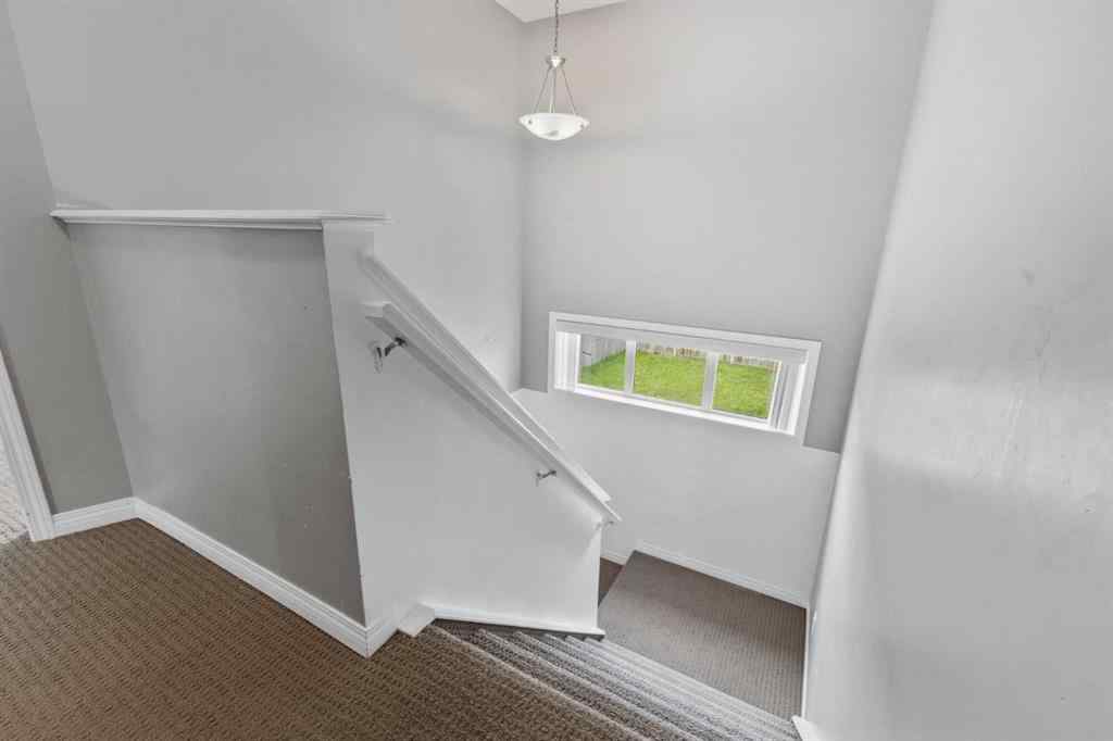 MLS® A2252688 - 205 Luxstone Way SW in Luxstone Airdrie, Residential