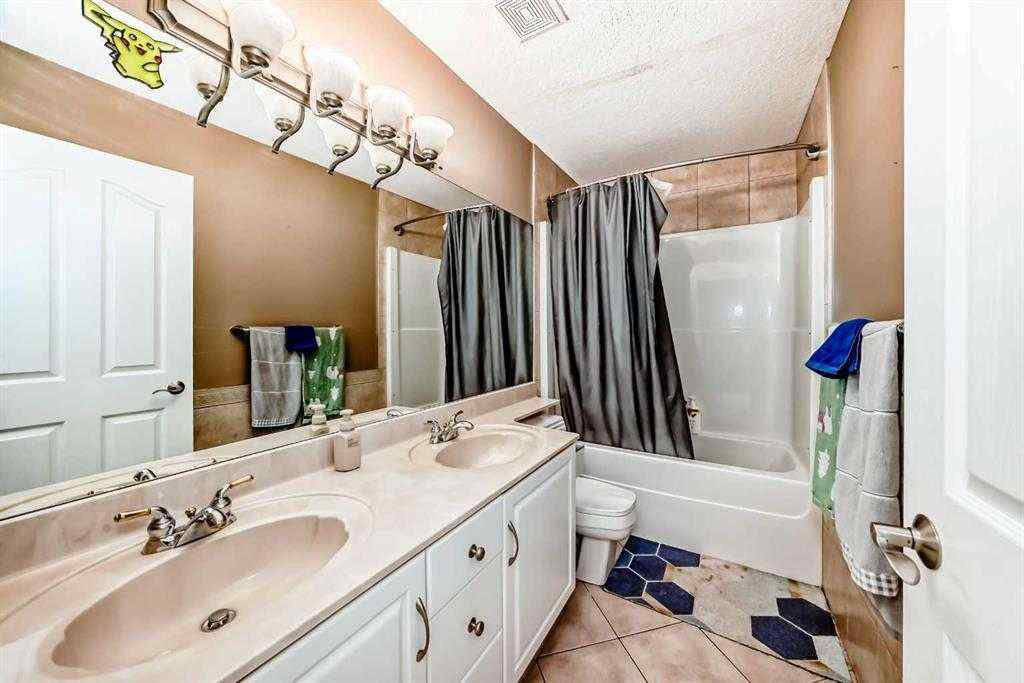 MLS® A2252694 - 73 Simcoe Close SW in Signal Hill Calgary, Residential