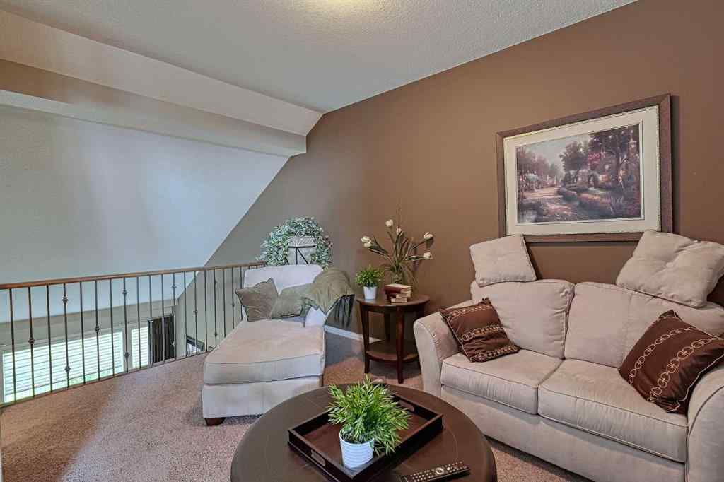 MLS® A2252718 - 223 Sunset Square  in Sunset Ridge Cochrane, Residential