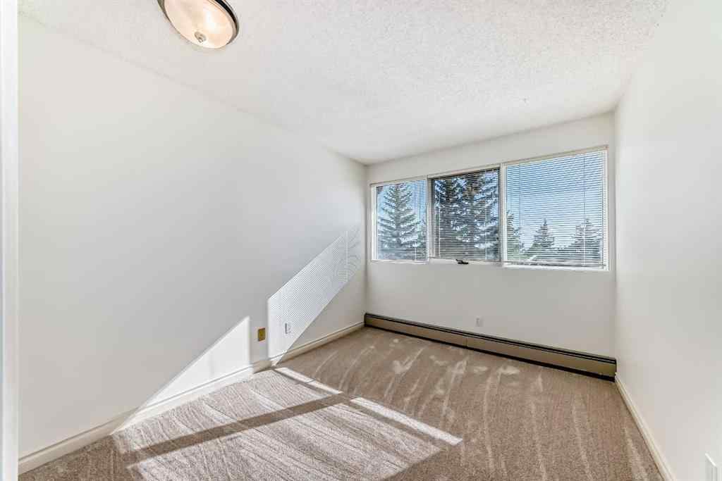 MLS® A2252807 - Unit #10 305 Village Mews SW in Patterson Calgary, Residential