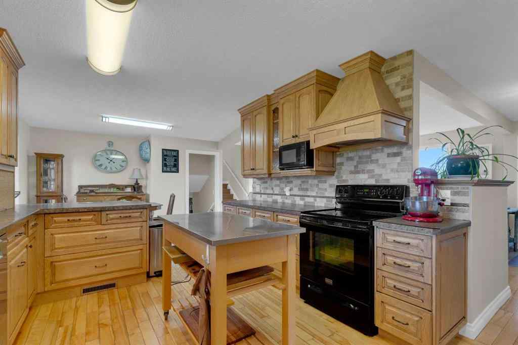 MLS® A2252813 - 466049 120 Street E in Alder Heights Rural Foothills County, Residential