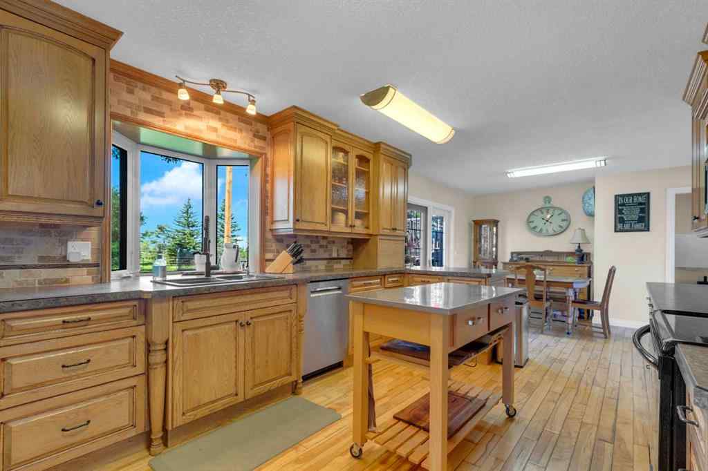 MLS® A2252813 - 466049 120 Street E in Alder Heights Rural Foothills County, Residential