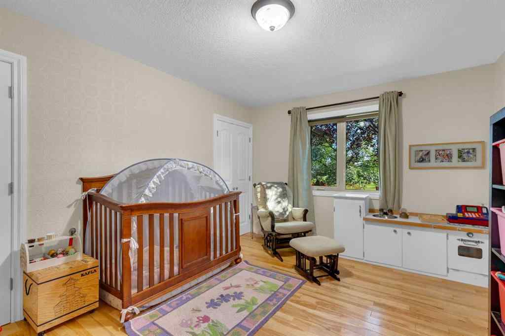 MLS® A2252813 - 466049 120 Street E in Alder Heights Rural Foothills County, Residential